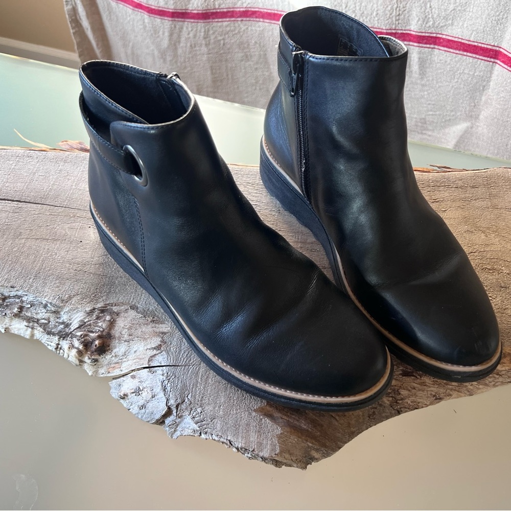 Clark’s black leather booties